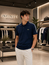Polo Lacoste blu navy con banda logo sulle spalle